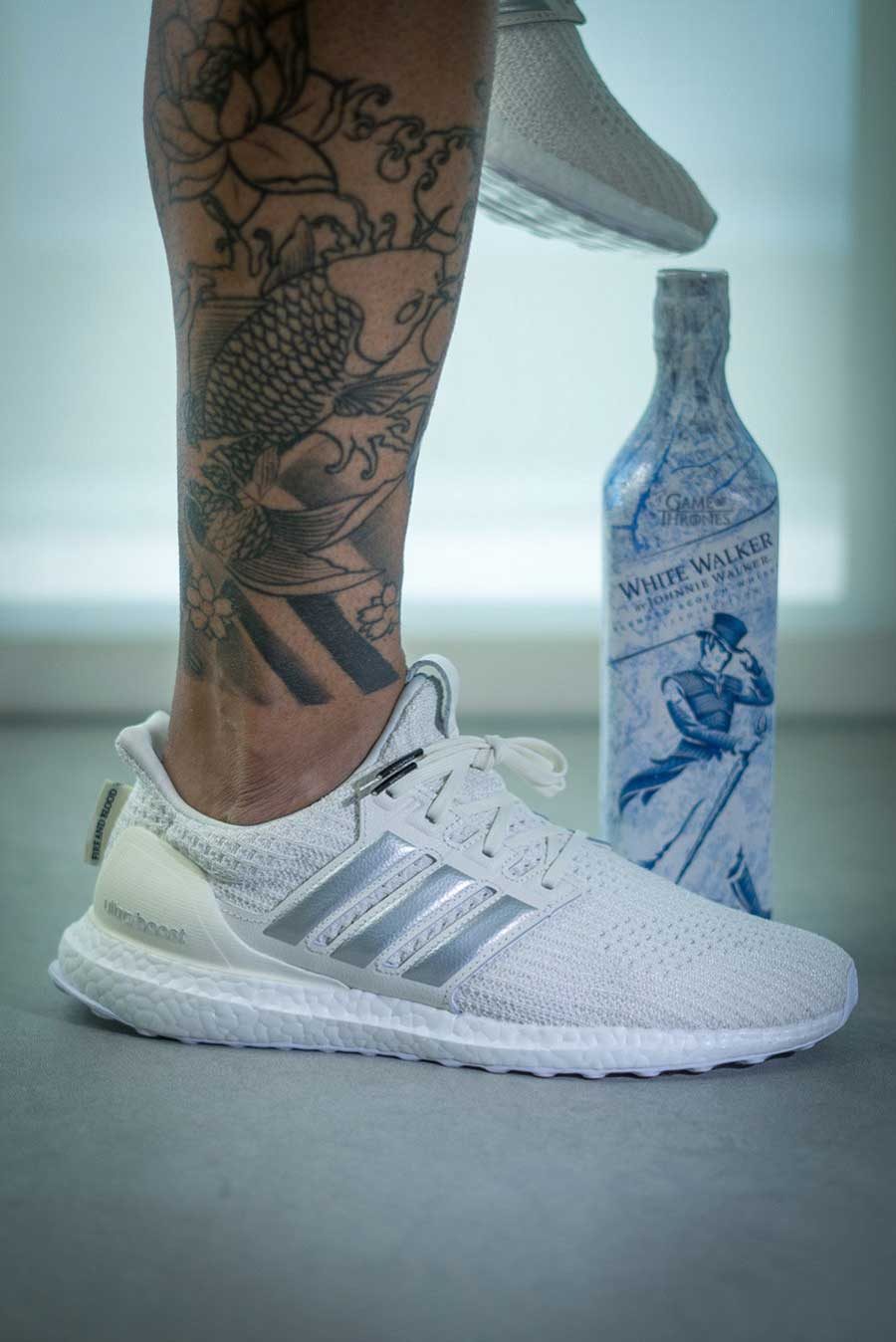 first-images-of-the-rumored-white-and-grey-e28098fire-and-bloode28099-adidas-sneakers-revealed-3-9684306