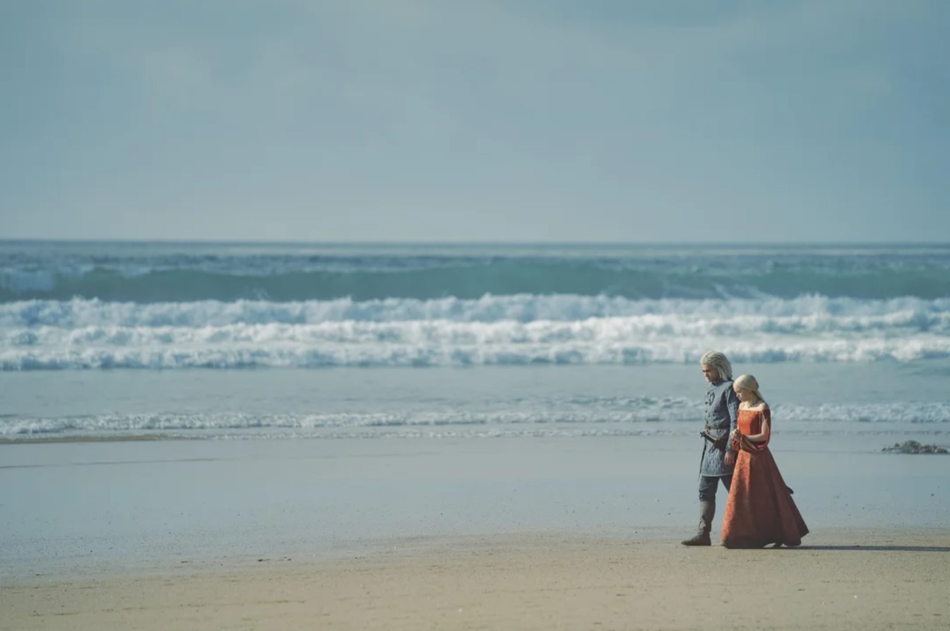 Rhaenyra and Laenor walking on the shore of Driftmark