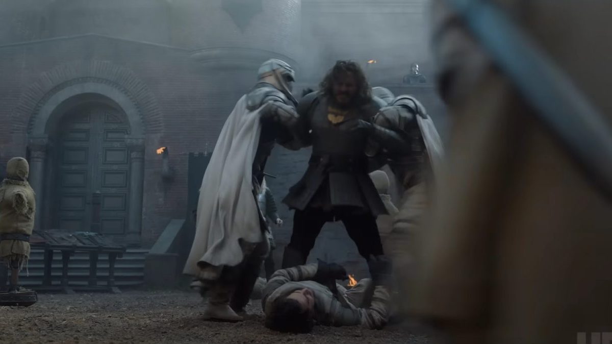 Ser Harwin being held back after punching ser criston